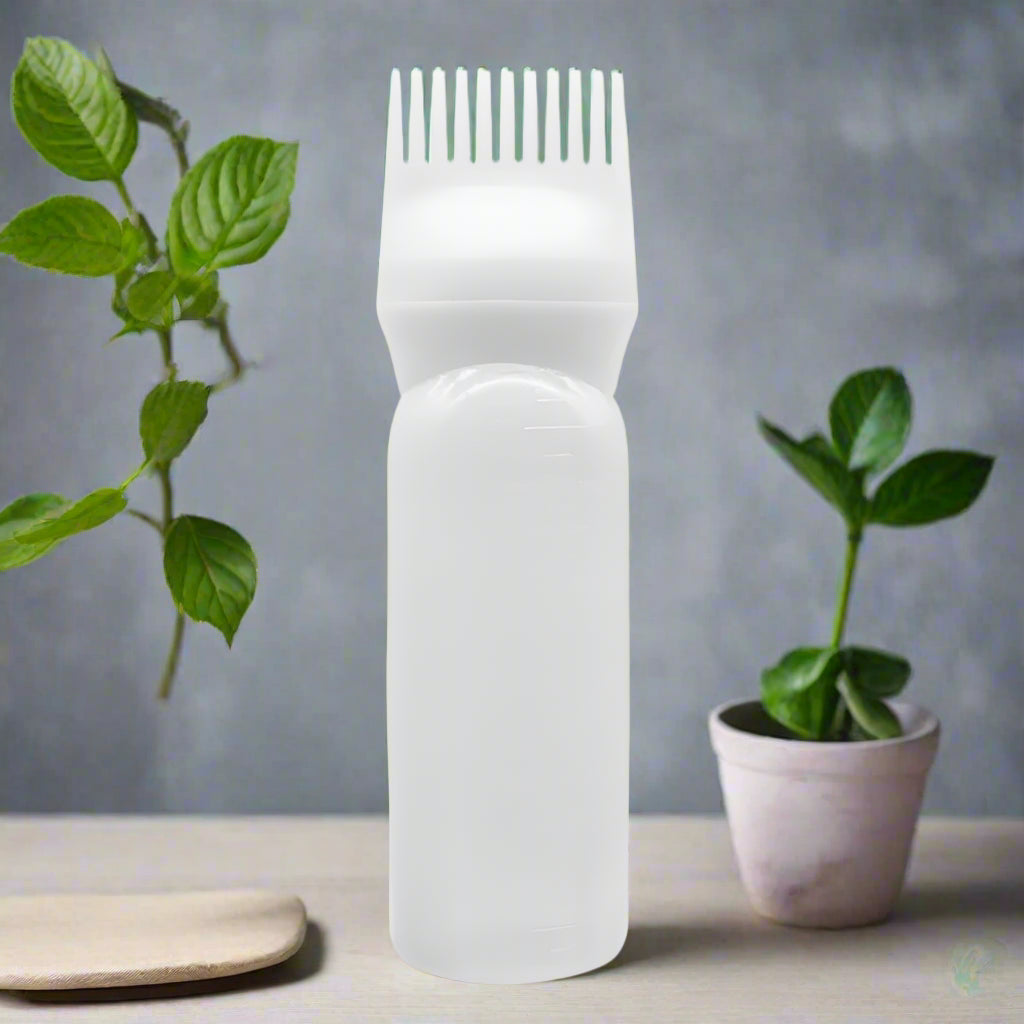 Applicateur pour huile blanc, avec embout doseur, idéal pour appliquer les huiles essentielles ou nourrissantes, simple et pratique.