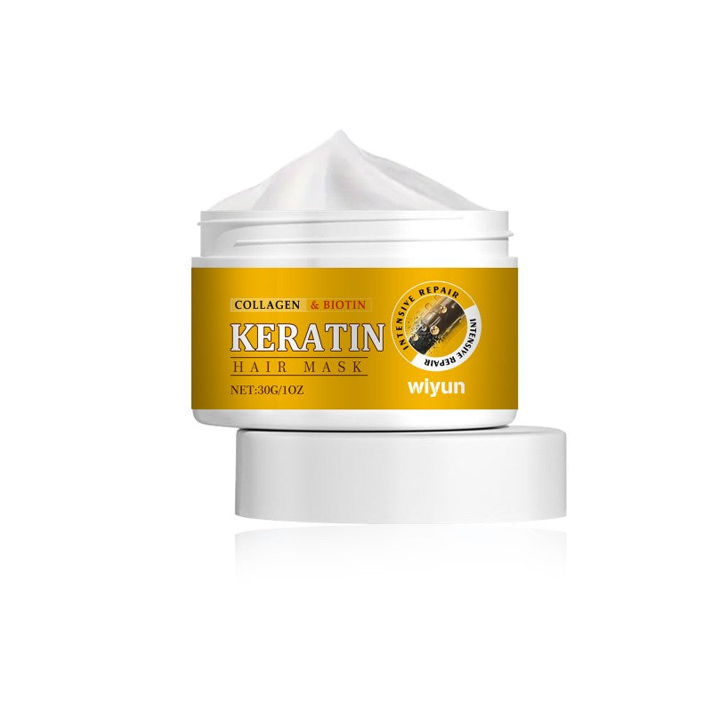 Crème réparatrice pour cheveux abîmés, enrichie en kératine, biotine et collagène, idéale pour nourrir, renforcer et lisser la fibre capillaire, sur fond blanc.