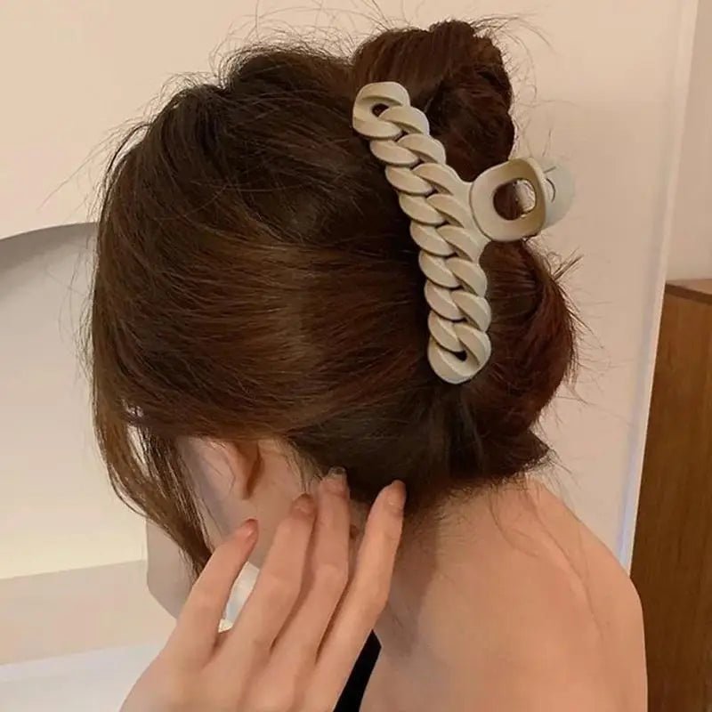 Pince cheveux torsadée - Cheveu Soyeux