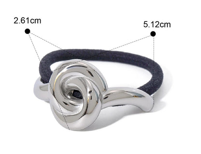 Élastique pour cheveux fleur argentée  finition métallique brillante pour un style raffiné