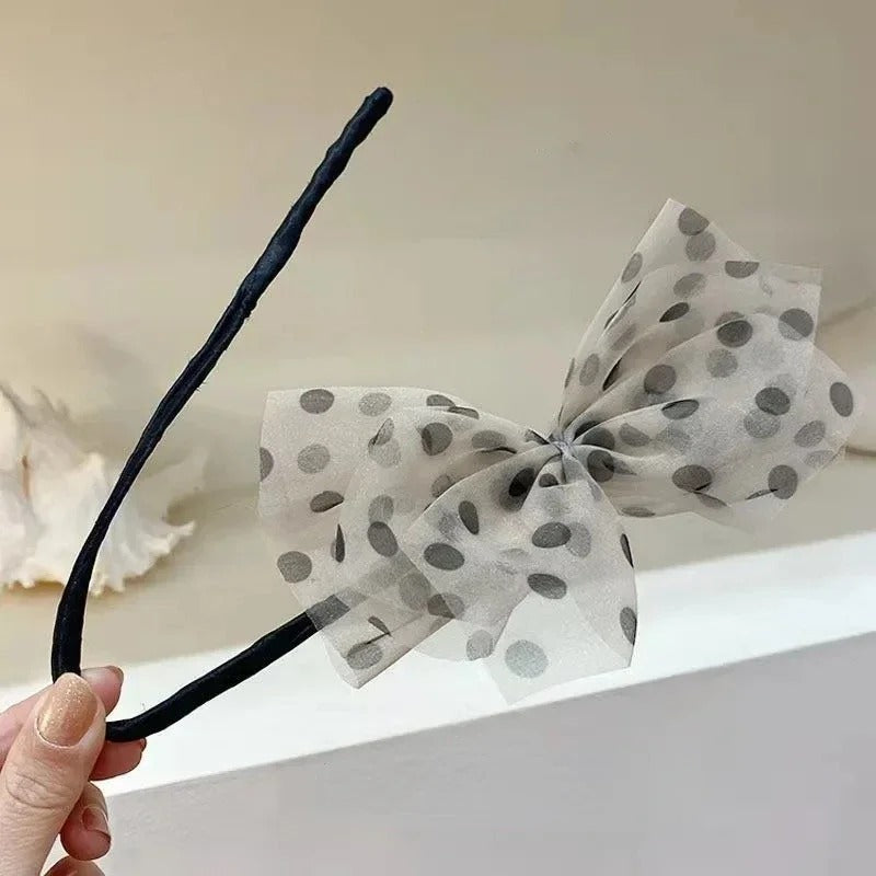 Décoration avec nœud pour cheveux en forme de fleur, idéale pour ajouter une touche élégante à votre coiffure