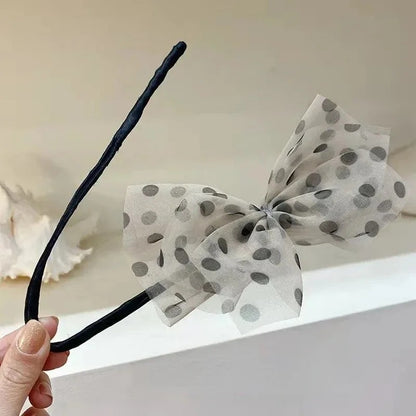 Décoration avec nœud pour cheveux en forme de fleur, idéale pour ajouter une touche élégante à votre coiffure