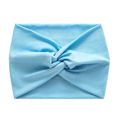 Bandeau cheveux bleu en tissu stretch, idéal pour le sport ou une tenue décontractée