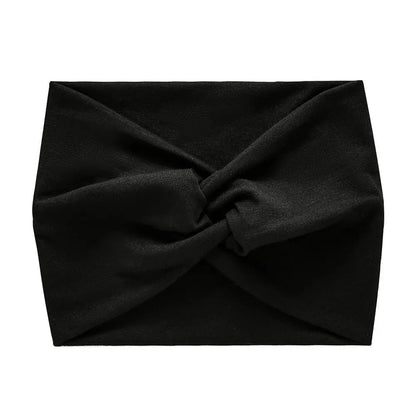 Bandeau cheveux noir en tissu stretch, idéal pour le sport ou une tenue décontractée