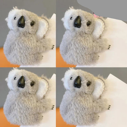4 Pinces  à cheveux peluche Koala  grise  : l'accessoire mignon et pratique - Parfaite pour les petites filles comme pour les adultes, cette pince originale et kawaii permet de maintenir vos cheveux tout en apportant une note ludique et mignonne-