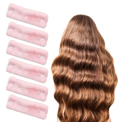 Lot de bigoudis roses pour mise en plis des cheveux à la maison
