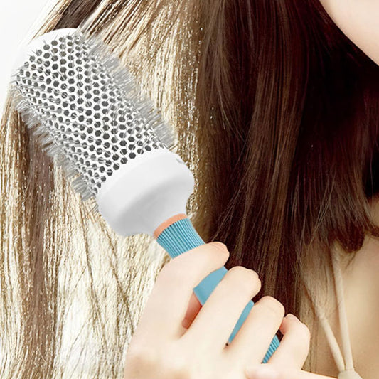 Brosse à brushing professionnelle, efficace pour un coiffage rapide, précis et une finition parfaite