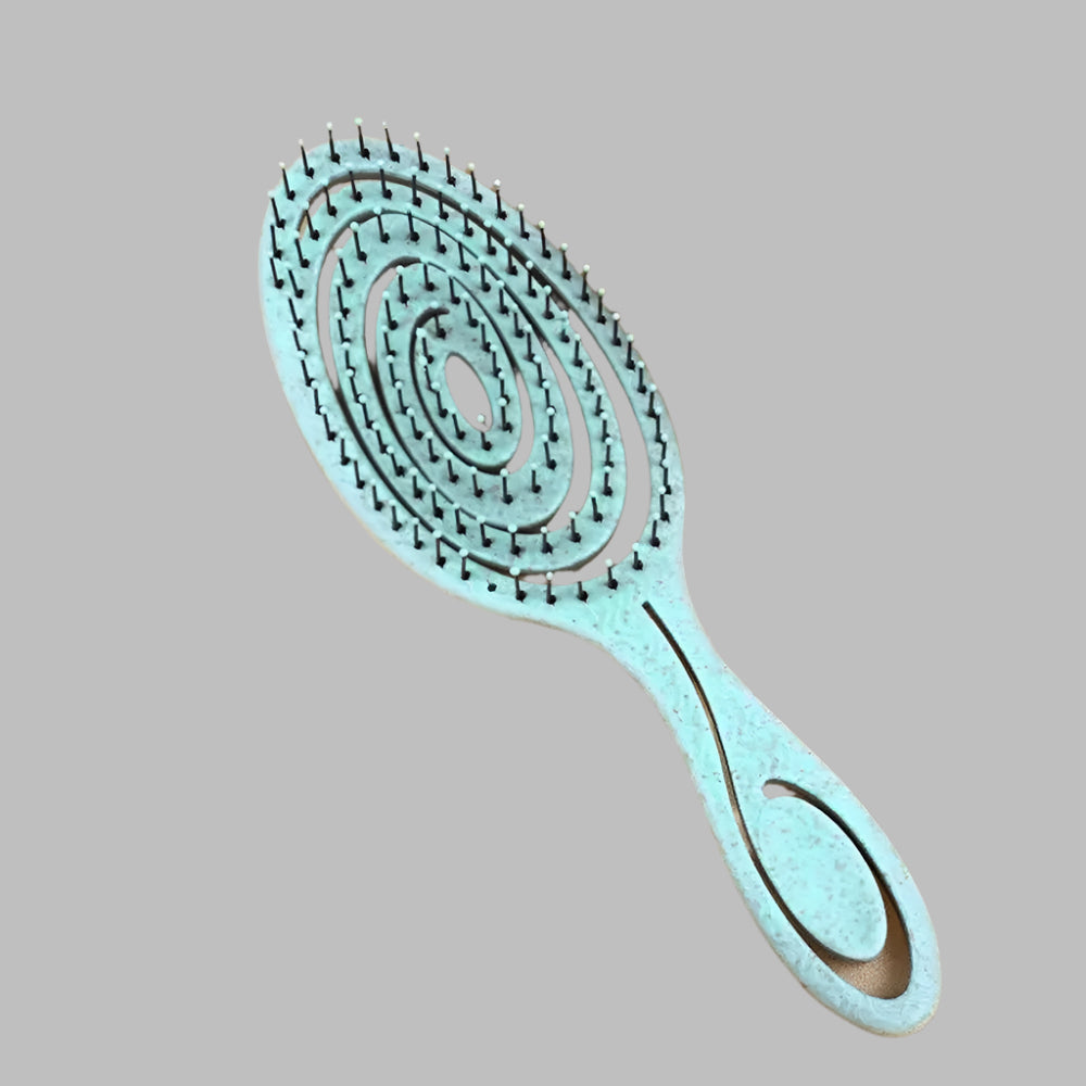 Brosse bleu à cheveux pour boucles, antistatique et démêlante, idéale pour cheveux bouclés ou frisés, avec picots souples pour un coiffage sans frisottis.