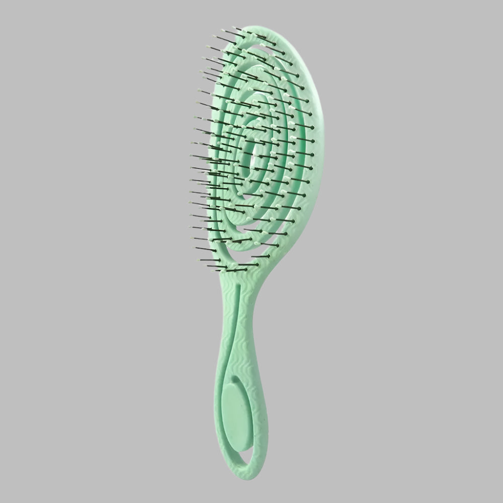 Brosse verte à cheveux pour boucles, antistatique et démêlante, idéale pour cheveux bouclés ou frisés, avec picots souples pour un coiffage sans frisottis.