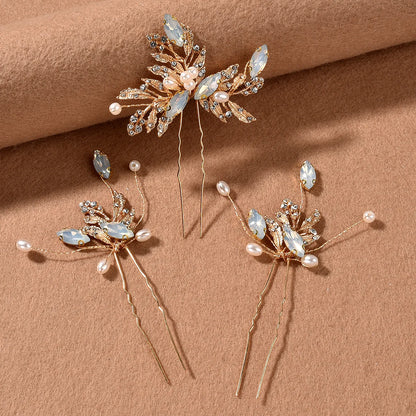 Accessoire cheveux élégant pour mariée ou mariée,  perles et détails dorés. 