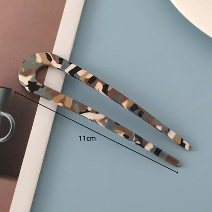 Épingle de 11 cm camouflage, conçue pour fixer les cheveux de manière discrète et sécurisée, idéale pour les coiffures de tous les jours ou les occasions