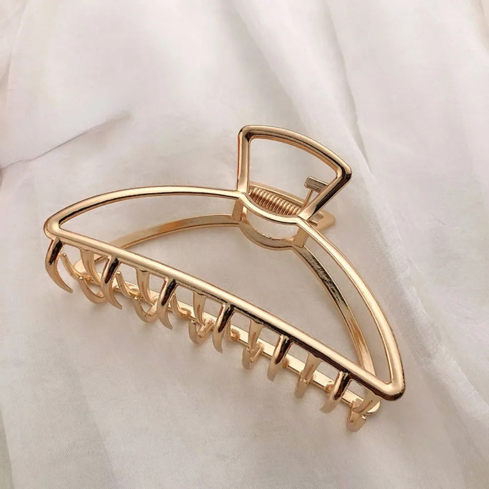 Pince à cheveux décorative en métal doré, pour un maintien solide et un style raffiné. Pince à cheveux élégante en métal, idéale pour maintenir les coiffures en place toute la journée.