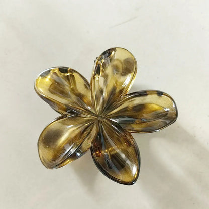 Pince à cheveux fleur en plastique résistant, ornée d’un motif léopard élégant – un accessoire tendance et léger pour sublimer vos coiffures