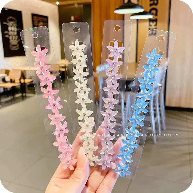 Pince à cheveux en forme de fleur, inspirée de l'univers féerique des petites princesses – colorée et pleine de charme, pour un look enfantin et éclatant.