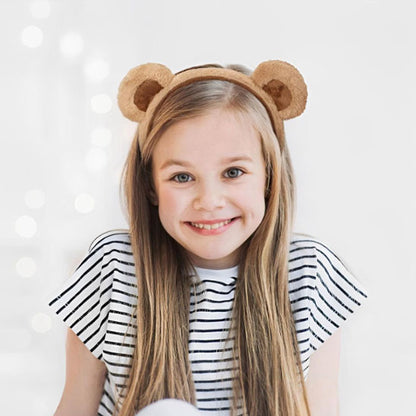 Serre-tête avec oreilles d’ourson, conçu pour maintenir les cheveux d'une fille en place tout en ajoutant une touche adorable