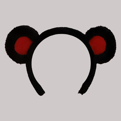 Serre-tête en peluche noir et rouge avec des oreilles d’ourson arrondies, idéal pour un déguisement ou un accessoire mignon