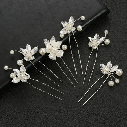 Ensemble de Bijoux cheveux mariage , de perles délicates et accents argentés. 